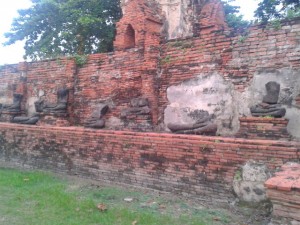 Buddhas line the walls in the ancient city of Ayutthaya